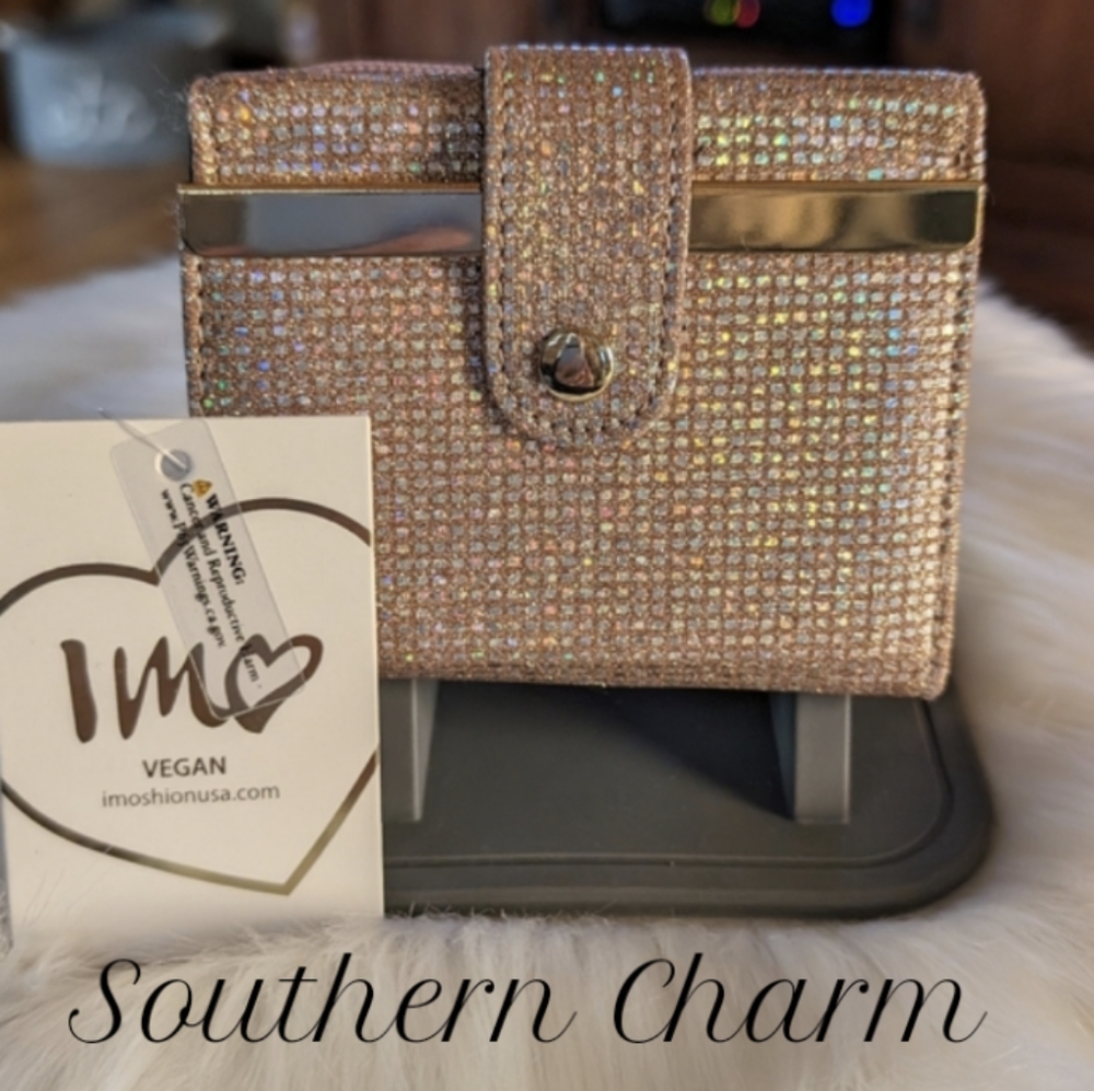 Faux Leather Zipper Wallet3.5 x 4.5Features a stylish glitter-embellished desig